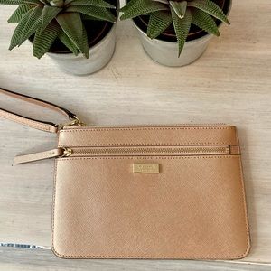 Kate Spade Wristlet Light Pink with Front Zip & Gold Detailing.